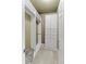Custom walk-in closet with bright white shelving and cabinets at 6618 Lynch Ln, Castle Rock, CO 80108