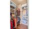 Spacious walk-in closet with custom shelving, providing ample space for organizing clothing and accessories at 6618 Lynch Ln, Castle Rock, CO 80108