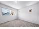 Well lit bedroom featuring neutral carpet and dual windows providing natural light at 1175 Highview Dr, Erie, CO 80516