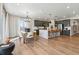 Spacious open concept living area and kitchen featuring modern fixtures and finishes at 17136 W 92Nd Loop, Arvada, CO 80007