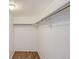 Walk-in closet with ample hanging space and wood-look flooring at 14006 E Stanford Cir # K04, Aurora, CO 80015