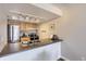 Efficient kitchen design features modern stainless steel appliances, practical countertops, and ample lighting at 14006 E Stanford Cir # K04, Aurora, CO 80015