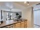The kitchen has a stainless steel sink, modern appliances, and a dining area at 14006 E Stanford Cir # K04, Aurora, CO 80015