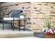 Cozy seating area on the front porch, perfect for relaxing and enjoying the curb appeal at 4635 S Odessa St, Centennial, CO 80015
