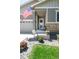 Inviting front porch with stone accents, ideal for enjoying the outdoors and neighborhood views at 4635 S Odessa St, Centennial, CO 80015