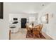 Well-lit kitchen with stainless steel appliances and adjacent dining area at 4635 S Odessa St, Centennial, CO 80015