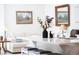 Bright kitchen island with seating and sink, perfect for food preparation and entertaining at 4635 S Odessa St, Centennial, CO 80015