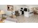 Open-concept living area shows seamless flow to the kitchen and dining spaces at 4635 S Odessa St, Centennial, CO 80015