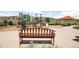 Community playground with play structures, a picnic pavilion, and a bench for relaxation at 4635 S Odessa St, Centennial, CO 80015