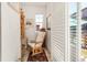 Cozy sitting area features a comfortable chair and natural light at 4635 S Odessa St, Centennial, CO 80015