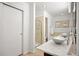 Bathroom featuring double sinks with glass bowls, and a walk-in shower at 5351 S Cody St, Littleton, CO 80123