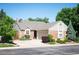 Charming single-story home with well-maintained landscaping, brick accents, and an attached two-car garage at 5351 S Cody St, Littleton, CO 80123