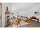 Inviting living room with a fireplace, stylish seating, and lots of natural light at 5351 S Cody St, Littleton, CO 80123