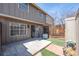 This cozy back patio with privacy fence is great for entertaining and outdoor dining at 7101 W Yale Ave # 3403, Denver, CO 80227