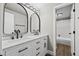 Modern bathroom featuring double sinks, modern fixtures and walk in shower at 7101 W Yale Ave # 3403, Denver, CO 80227