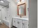 Bright bathroom with a shower-tub combination and vanity with storage at 7101 W Yale Ave # 3403, Denver, CO 80227