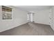 Bedroom featuring natural light, closet, and access to the balcony at 7101 W Yale Ave # 3403, Denver, CO 80227