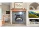 Close up of a decorative fireplace with marble surround at 23961 E Easter Pl, Aurora, CO 80016