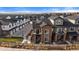 Townhome community with mountain views in the background at 5199 S Fairplay St, Aurora, CO 80015