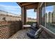 Private patio with small table and chairs, perfect for relaxing at 5199 S Fairplay St, Aurora, CO 80015