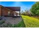 Backyard boasts covered deck, patio, and landscaped lawn at 14793 E Hampden Pl, Aurora, CO 80014