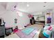 Colorful decorated bedroom with an abundance of natural light at 14793 E Hampden Pl, Aurora, CO 80014