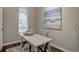 Bright home office with a modern desk, decorative art, and a comfortable chair at 124 Elati St, Denver, CO 80223