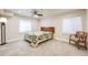 Basement bedroom with a full-size bed and a ceiling fan at 13942 Jackson St, Thornton, CO 80602