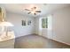 Well-lit bedroom featuring neutral walls and carpeted floors at 13942 Jackson St, Thornton, CO 80602