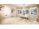 Breakfast nook in kitchen with bay window and granite countertop at 13942 Jackson St, Thornton, CO 80602