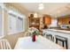 Kitchen nook with bay window and granite countertop at 13942 Jackson St, Thornton, CO 80602