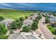 Elevated view showcasing the rooflines, landscaping, and street layout of the desirable neighborhood at 7866 Witney Pl, Lone Tree, CO 80124