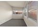 Sunroom with grey carpet and multiple windows at 1250 S Tennyson St, Denver, CO 80219