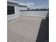 An expansive rooftop deck with gray composite decking at 14223 Currant St, Broomfield, CO 80020