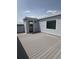 Spacious rooftop deck with gray composite decking, views, and access to the house at 14223 Currant St, Broomfield, CO 80020