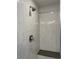 Tiled stand-up shower showcasing modern fixtures and an integrated shower bench at 14223 Currant St, Broomfield, CO 80020