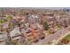 A beautiful aerial view displays the neighborhood, mature trees, and a red arrow identifies this property at 161 S Pearl St, Denver, CO 80209
