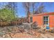 A brick patio with iron chairs, a table, and shade at 161 S Pearl St, Denver, CO 80209