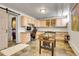 Finished basement featuring a foosball table, built-in desk area, and sliding barn door at 161 S Pearl St, Denver, CO 80209