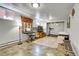 Finished basement with recreational equipment, a tapestry, and a window at 161 S Pearl St, Denver, CO 80209