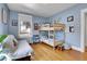Bedroom with a daybed, bunk beds, hardwood floors, and decor at 161 S Pearl St, Denver, CO 80209