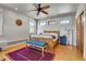 Inviting bedroom featuring hardwood floors, and natural light from several windows at 161 S Pearl St, Denver, CO 80209