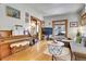 Cozy living room featuring hardwood floors, natural light, and comfortable seating at 161 S Pearl St, Denver, CO 80209