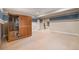 Spacious basement area with a sauna and an open layout leading to other rooms at 8440 Rush Creek Ave, Littleton, CO 80125