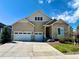 Charming two-story home features a stone accent and three-car garage for ample parking at 8440 Rush Creek Ave, Littleton, CO 80125