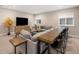 Cozy living room featuring comfortable seating, a TV, and stylish decor at 8440 Rush Creek Ave, Littleton, CO 80125