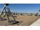 Neighborhood playground with swings, slides, and climbing structures provides a recreational space for children at 8440 Rush Creek Ave, Littleton, CO 80125