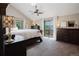 Serene bedroom with natural light, mountain views and balcony access at 351 N Saddle Dr, Idaho Springs, CO 80452