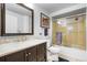 Updated bathroom features a vanity with marble countertop and a glass-enclosed shower at 444 17Th St # 603, Denver, CO 80202