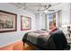 Spacious bedroom with windows, art, and a comfortable bed at 444 17Th St # 603, Denver, CO 80202